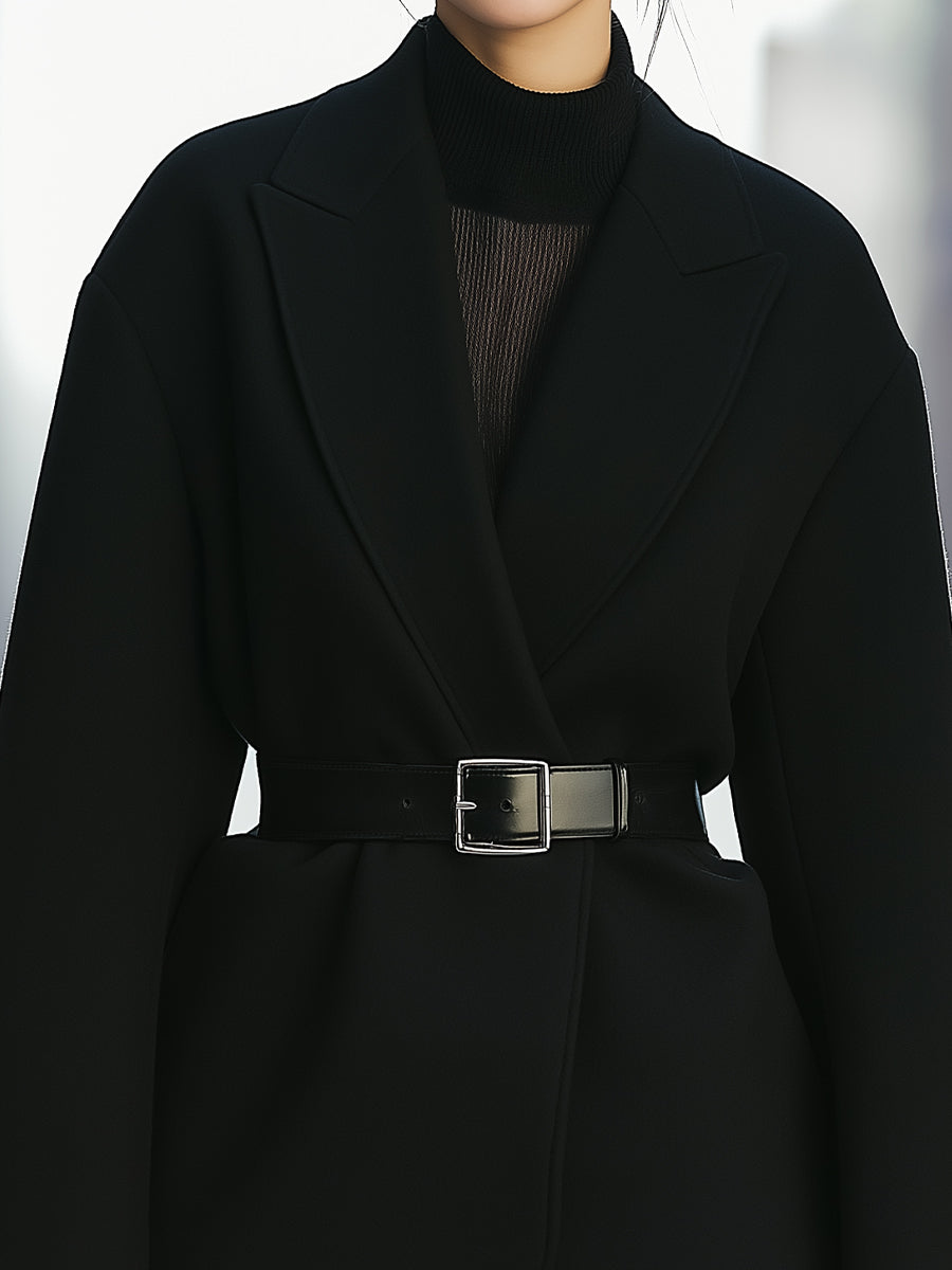Black Wynne blazer dress with oversized fit and belt from Lumina Wear, styled with long sleeves and tailored silhouette.