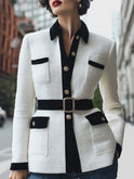 White blazer jacket from Lumina Wear with a black velvet collar, styled on a model, perfect for elegant casual or formal looks.