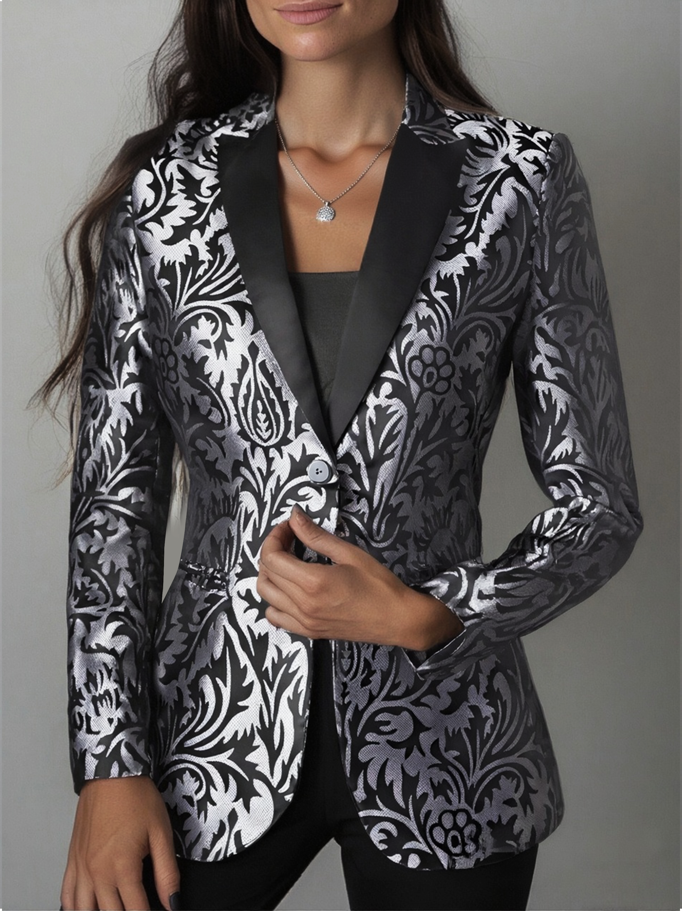 Black satin jacquard blazer by Lumina Wear, styled on a model, featuring a tailored fit and elegant design.