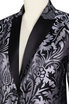 Black satin jacquard blazer by Lumina Wear, tailored fit with elegant lapels, styled on a mannequin.
