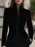 Black Aurelie blazer with contrast trim from Lumina Wear, shown on a model, featuring tailored fit and stylish design.