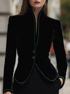 Black Aurelie blazer with contrast trim from Lumina Wear, shown on a model, featuring tailored fit and stylish design.