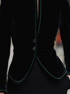 Black Aurelie blazer with contrast trim from Lumina Wear, shown in XS size on a model.