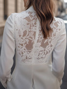 Lumina Wear Rosalyn blazer with structured silhouette in white, featuring tailored design and classic fit on model.