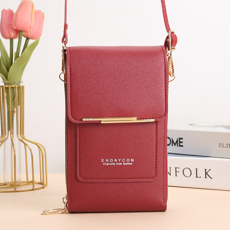 Black Lumina Wear Elena touchscreen messenger bag for women, featuring sleek design and modern style.