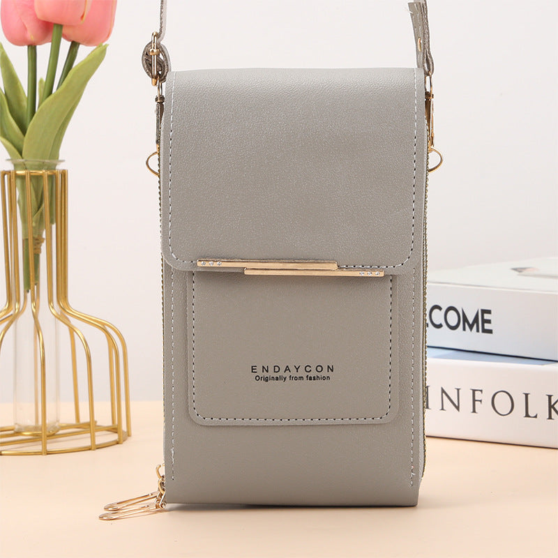 Black Lumina Wear Elena chic touch screen messenger bag for modern women, featuring sleek design and functional compartments.