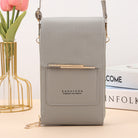 Black Lumina Wear Elena chic touch screen messenger bag for modern women, featuring sleek design and functional handbag style.