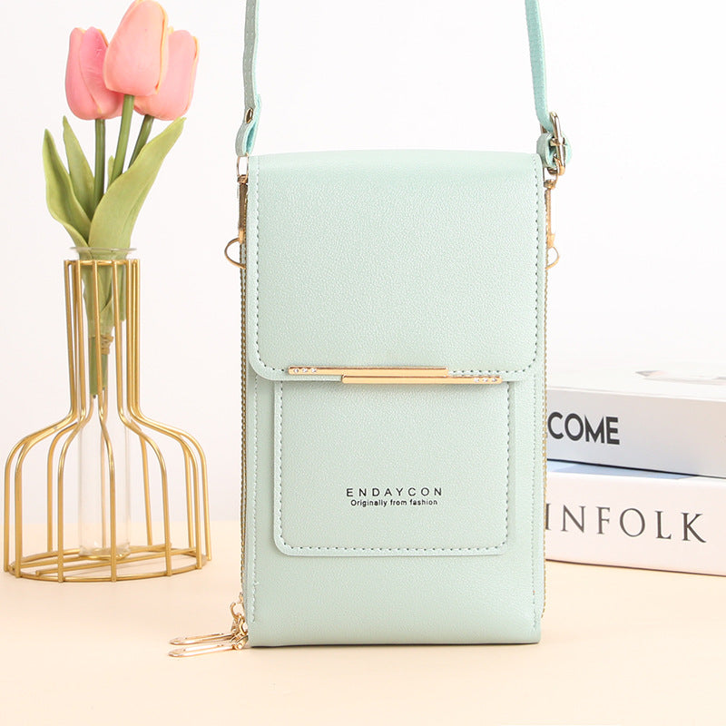 Black Lumina Wear Elena chic touch screen messenger bag for women, stylish handbag with modern design and functional features.
