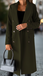 Olive green Elena Lumina Wear classic tailored coat with structured fit, long sleeves, and collar, displayed on a hanger.