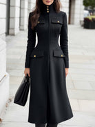 Black Marlowe coat dress with military details from Lumina Vancouver, featuring a midi length and structured design.