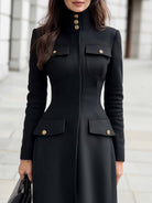 Black Marlowe coat dress with military details by Lumina Vancouver, featuring a midi length and tailored silhouette.