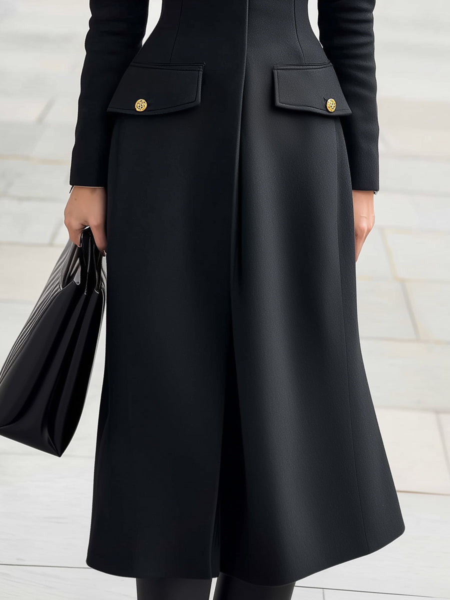 Black Marlowe coat dress with military details, midi length, by Lumina Vancouver, displayed on a mannequin.