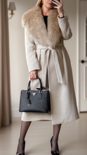 Ivory Elena coat by Lumina Wear featuring faux fur collar and belt, stylish winter outerwear with a cozy, elegant look.