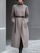 Taupe Wilhelmina coat with minimalist belt design by Lumina Vancouver, shown on a model with a tailored fit and clean lines.