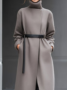 Taupe Wilhelmina coat by Lumina Vancouver featuring a minimalist belted design, shown on a model with a stylish, tailored fit.