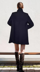Navy blue Elena collar maxi structured coat by Lumina Vancouver, showing the elegant design and tailored fit in a close-up shot.