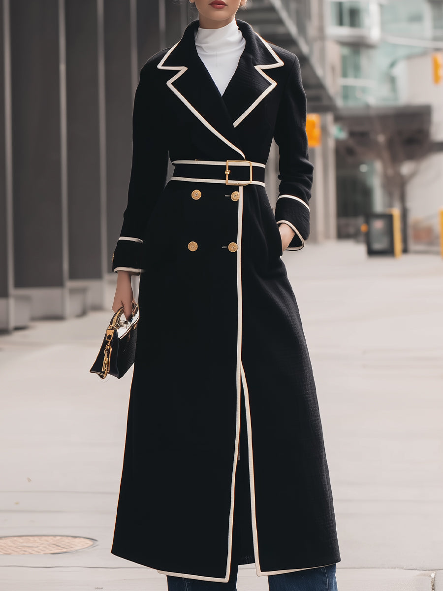 Black Colleen double-breasted belted long coat by Lumina Vancouver, shown on a model with classic lapels and a waist belt.