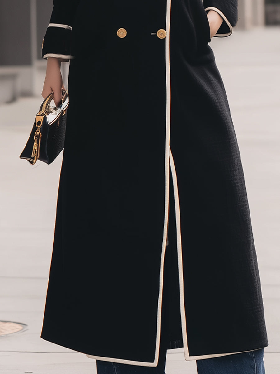 Black double-breasted belted long coat by Lumina Vancouver, featuring a tailored fit and classic design.