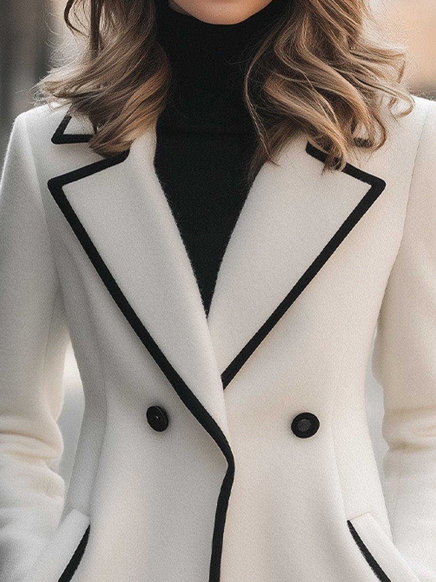 Lumina Vancouver Freya double-breasted white coat with black trim, stylish and tailored for a sophisticated look.