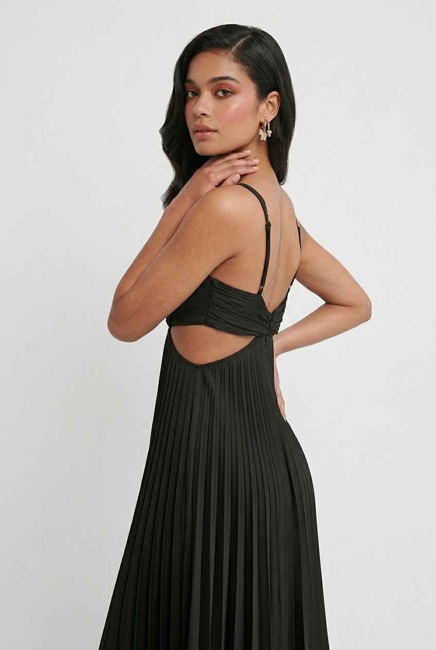 Elegant black pleated dress by Lumina Wear featuring a flattering silhouette, perfect for stylish occasions.