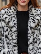 White Doris faux fur jacket by Lumina Vancouver, shown on a model, featuring plush texture and stylish design.