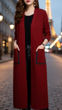 Red Lumina Wear Elena longline coat with functional pockets, urban style, shown in XS size.