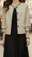 White Elena high neck jacket by Lumina Wear, stylish outerwear with a high neckline, shown in size XS.
