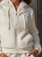 Lumina Vancouver Ida hooded jacket with zip front and fleece panels in white, shown in XS size.