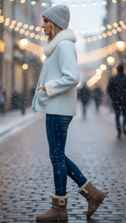 Light blue Elena jacket with fluffy collar by Lumina Wear, showing the cozy collar and stylish fit in a close-up image.
