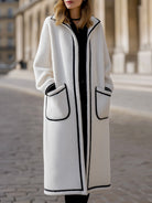 Longline Harlow coat in contrast piped wool-blend fabric by Lumina Vancouver, shown in white with XS size.