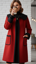 Red Elena longline coat with contrast trim by Lumina Wear, displayed on a mannequin, showcasing stylish outerwear design.