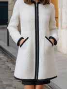 Lumina Vancouver Fern polar fleece coat with contrast trim, white color, lightweight and cozy, perfect for cold weather.