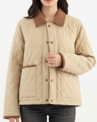 Beige quilted cropped coat with corduroy collar by Lumina Vancouver, featuring a stylish and cozy design.