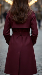 Lumina Vancouver Elena Rouge double-breasted belted trench coat in burgundy, showing front view with lapels and waist belt.
