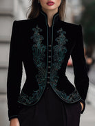 Black tailored blazer with buttons from Lumina Wear, shown on a mannequin, featuring structured fit and classic lapel design