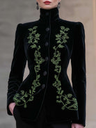 Black Bettina tailored blazer with high neck and velvet embroidery by Lumina Wear, shown on a model.