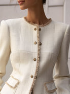 Cream textured blazer with decorative trim from Lumina Wear, styled with a tailored fit and elegant design.