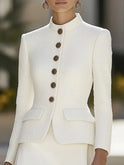 White Elena textured blazer with stand collar, gold buttons, by Lumina Wear, shown on a model.
