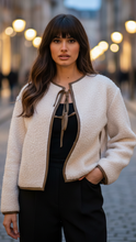 Beige Elena textured tie-front cropped coat by Lumina Wear, shown on a model, featuring a stylish cropped design and tie-front detail.