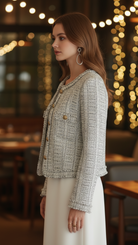 Light blue Elena tweed jacket with contrast trim by Lumina Vancouver, showing tailored fit and textured fabric.
