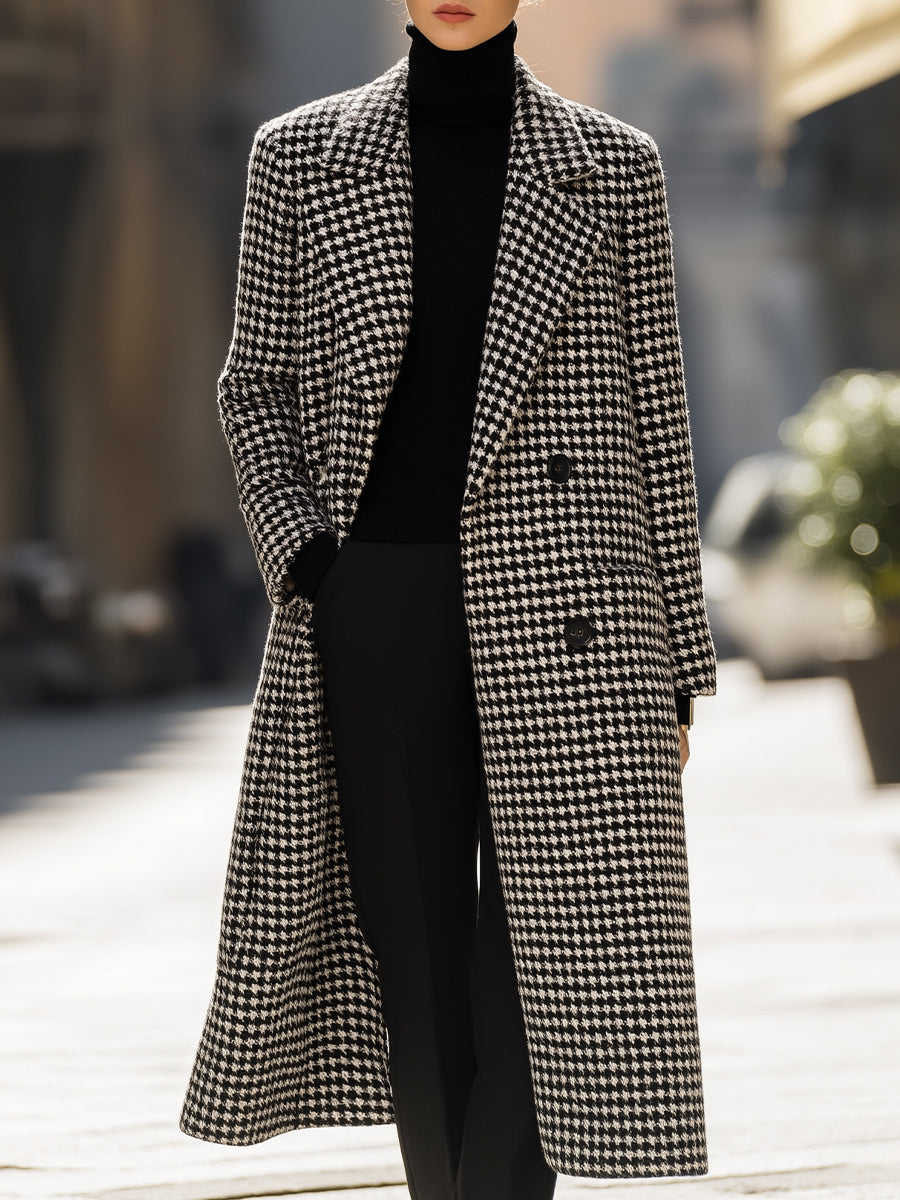 Black Marion Lumina Vancouver houndstooth wool long coat displayed on a model, showcasing its tailored fit and classic pattern.