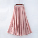 Beige Elianne Maxi Skirt by Lumina Wear featuring a high waist and flowing design, displayed on a white background.