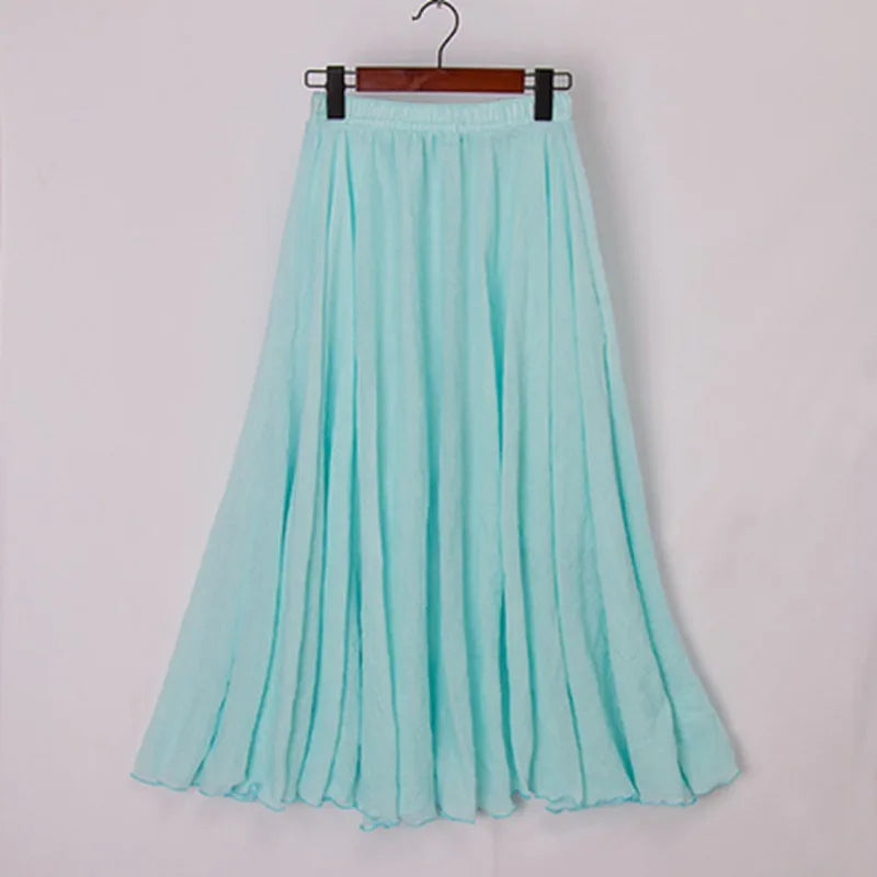 Elegant beige high-waist maxi skirt from Lumina Wear, flowing fabric and stylish design perfect for sophisticated looks.