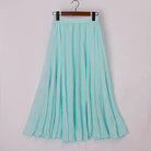 Elegant beige high-waist maxi skirt from Lumina Wear, flowing fabric and stylish design perfect for sophisticated looks.