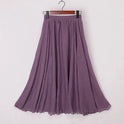 Beige Elianne maxi skirt with high waist from Lumina Wear, flowing fabric and elegant design for a sophisticated look.