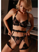 Black lace lingerie set by Lumina Vancouver featuring a bra and matching panties, displayed on a neutral background.