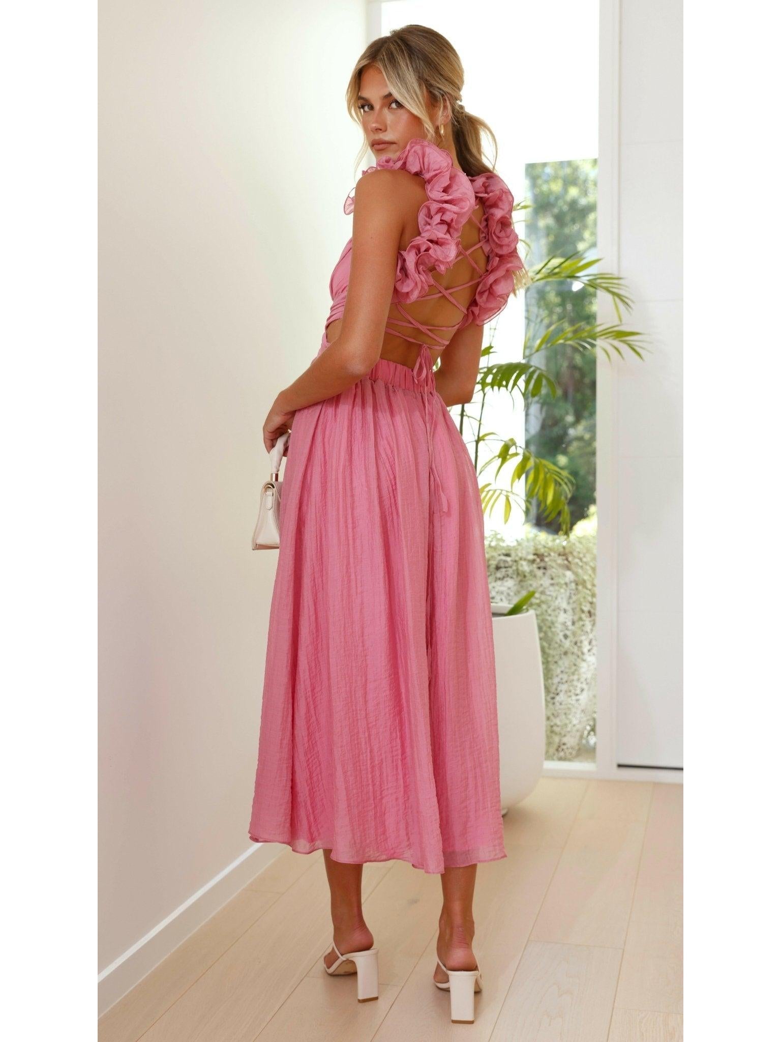 Pink Severine elegant summer wedding guest dress by Lumina Vancouver, featuring a flowy design and stylish details.