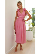 Pink Severine elegant summer wedding guest dress by Lumina Vancouver, featuring a flowy design perfect for warm-weather events.
