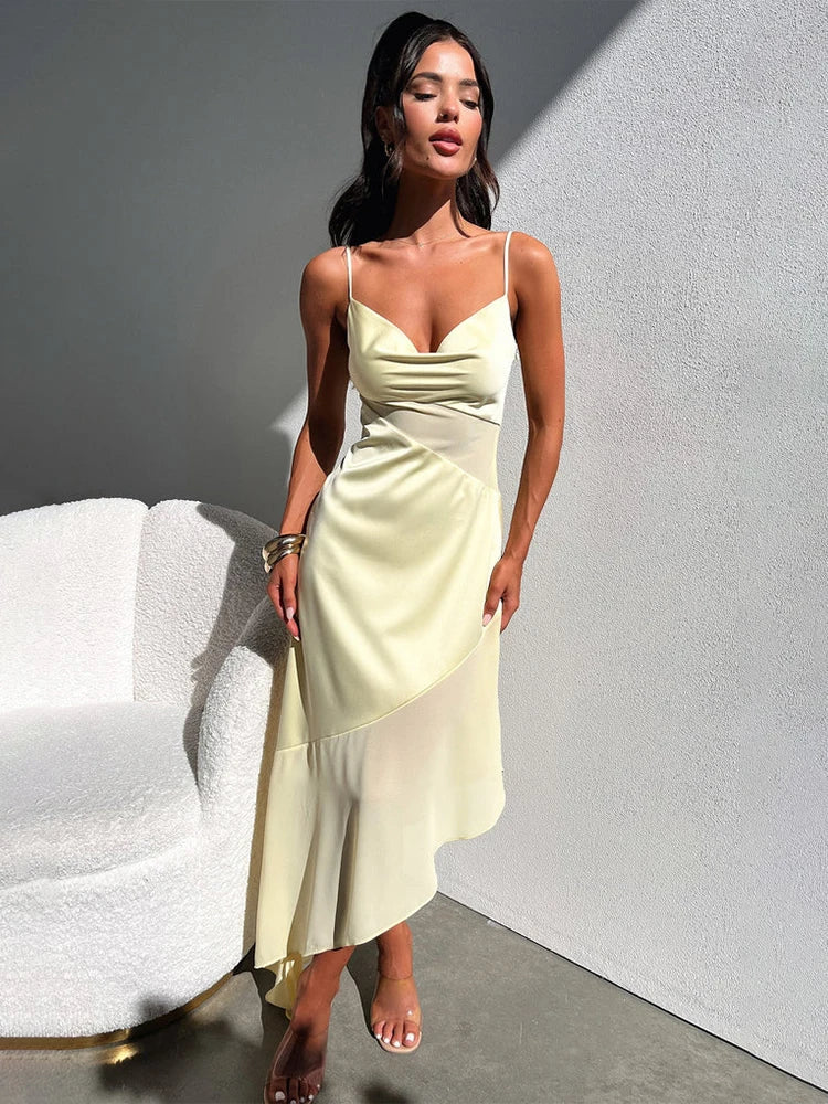 Black Elowen Satin Midi Dress by Lumina Vancouver, featuring elegant satin fabric and a flowing midi length.
