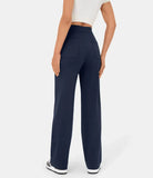 Elsa black high-waist trousers with pockets from Lumina Wear, featuring a comfortable fit and sleek dark blue fabric.